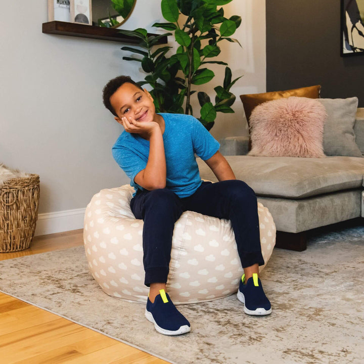 Boy sitting on kids beanbag chair #color_mini-clouds-oat-smartmax