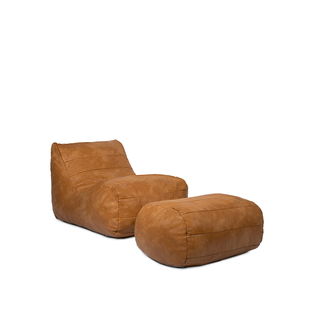 Sophistication meets relaxation Modora Chair and Ottoman #color_copper-harbor-premium-vegan-leather