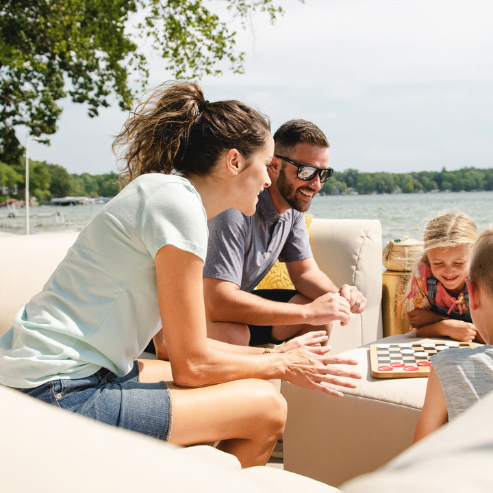 6pc tan outdoor sectional sofa family playing games outside #color_terra-bask
