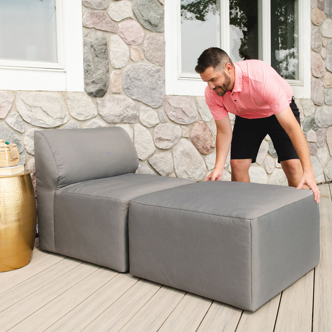 Man moving 2pc sectional chair #color_granite-bask