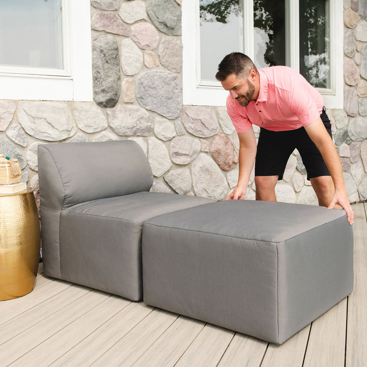 Man moving 2pc sectional chair #color_granite-bask