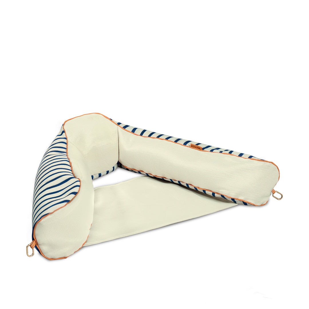 angle view Lux Bali Sling Pool Float #color_navy-and-ivory-stripe
