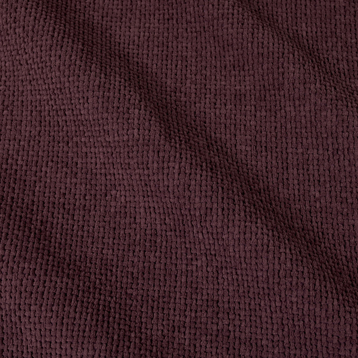 Close-up of merlot textured fabric