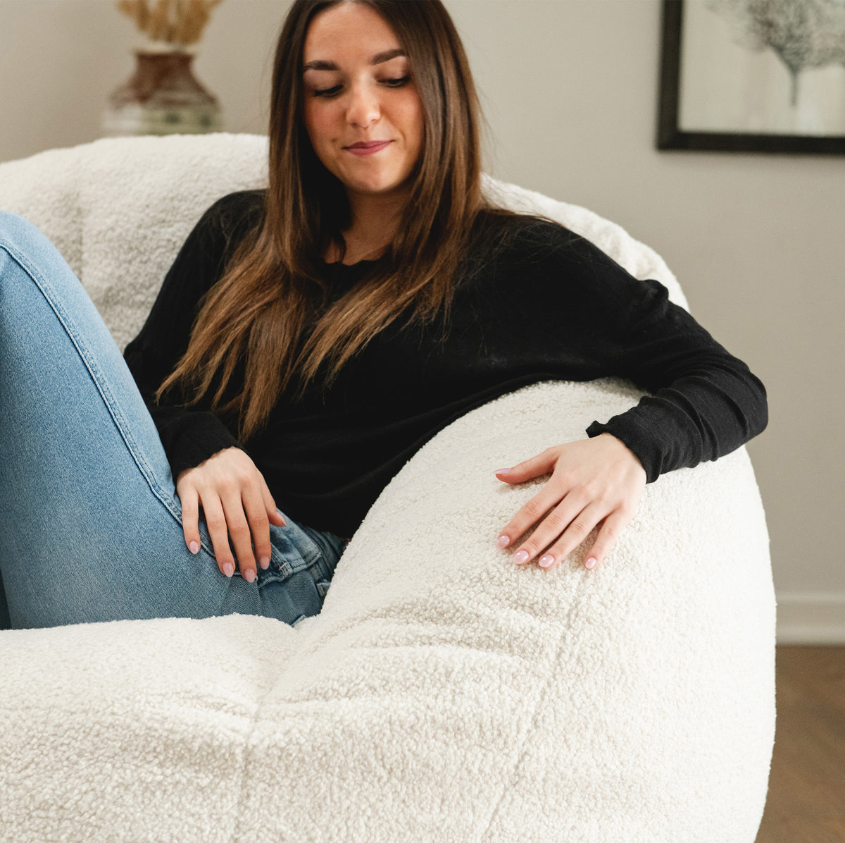 Girl touching the fabric on a foam chair