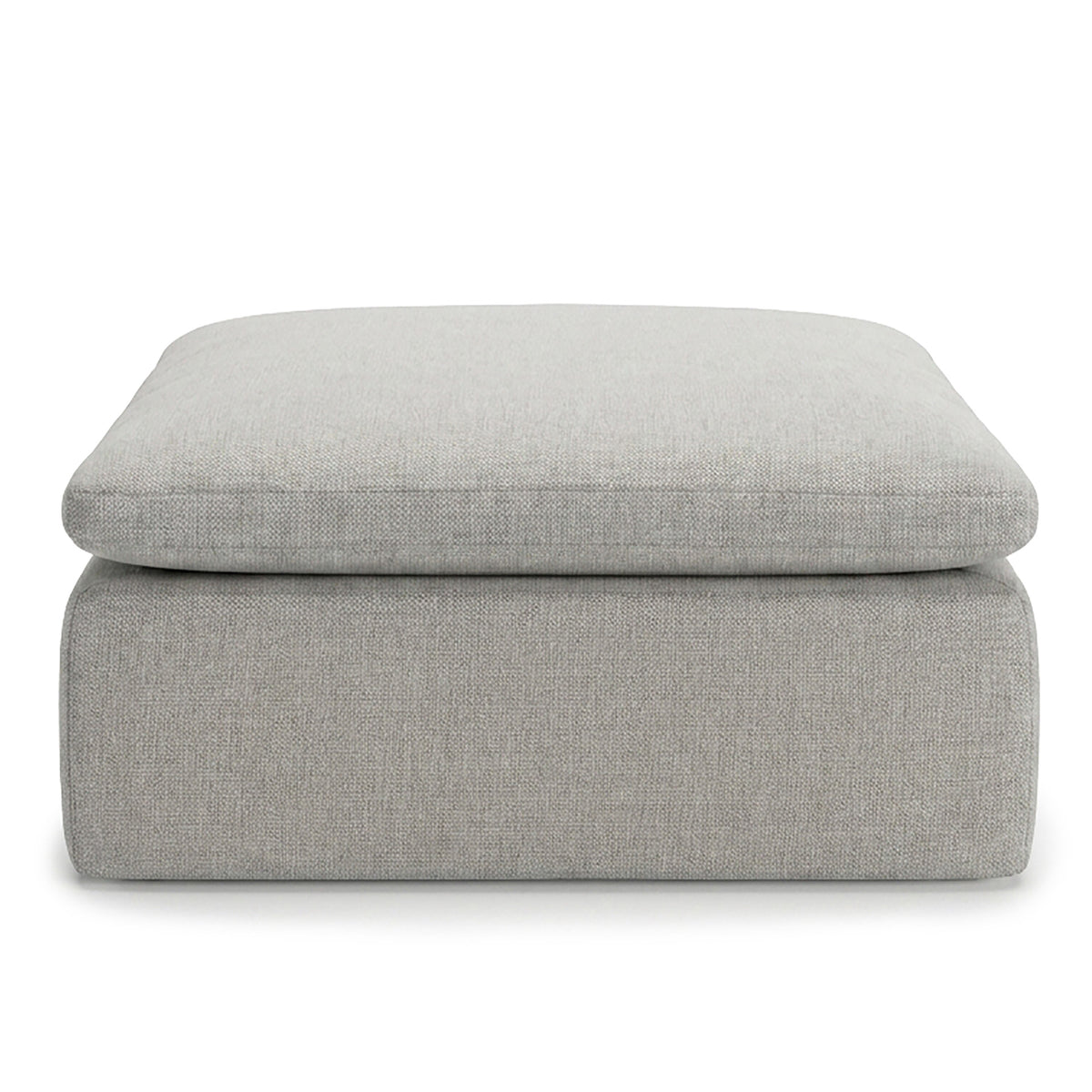 Gray upholstered ottoman on a white background #color_cottage-gray-terra-knit