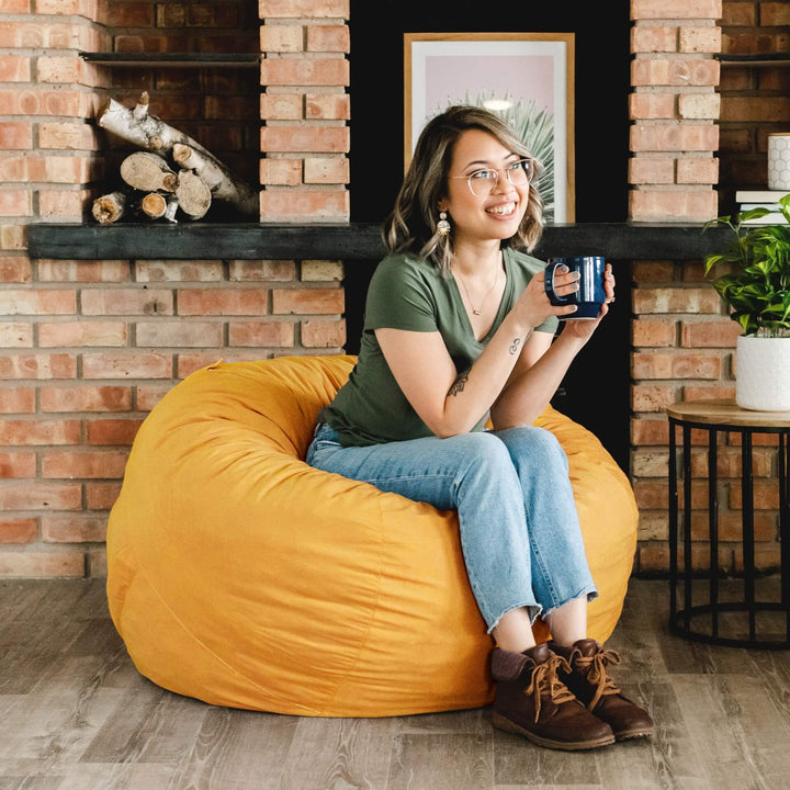 Girl on fuf medium in yellow #color_mustard-plush