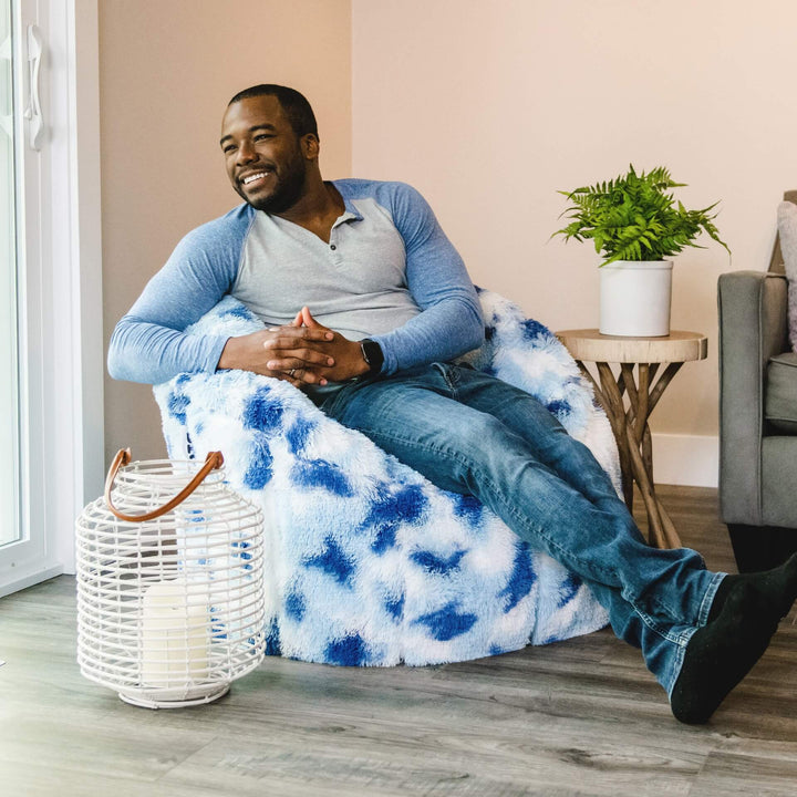 Milano Beanbag Chair for Adults man relaxing #color_indigo-tie-dye-plushie