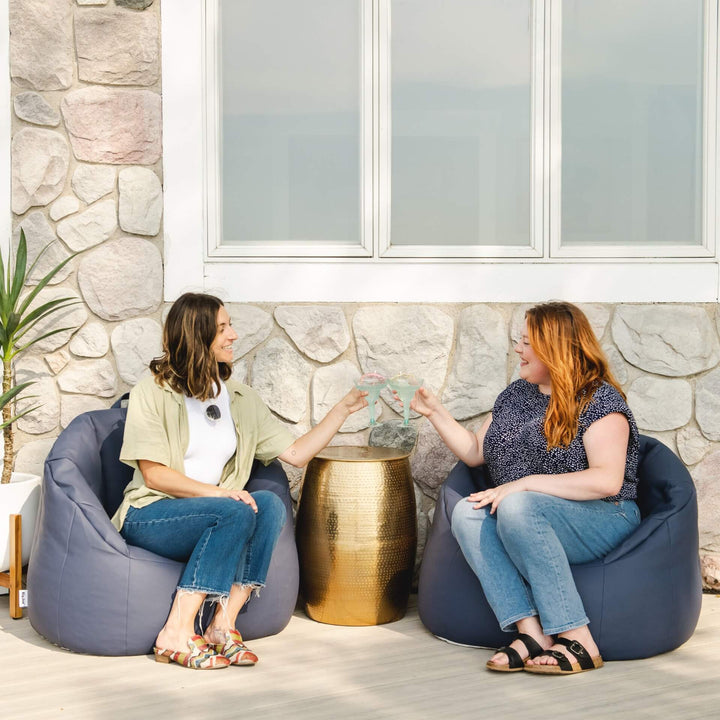 Outdoor Vinyl Patio Chair Adults Relaxing on the Patio #color_navy-marine-vinyl
