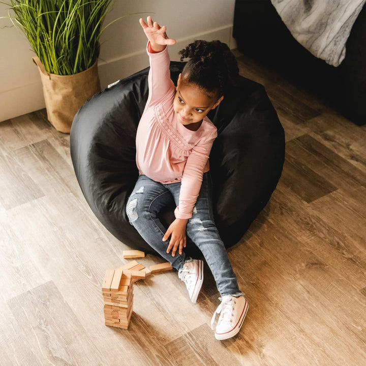 Girl on black kids beanbag #color_stretch-limo-black-smartmax