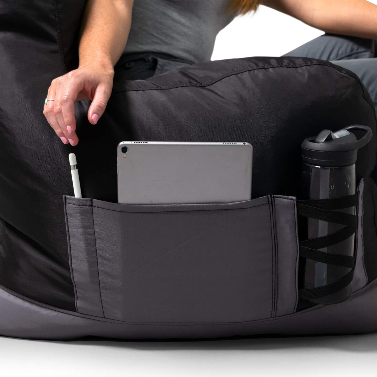 Bean bag chair with pockets and cup holder