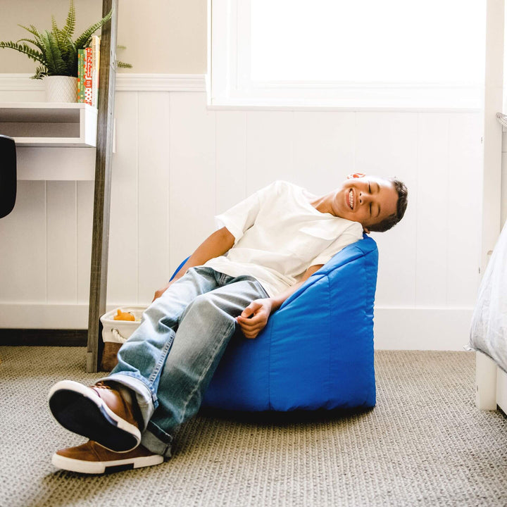 Milano Kids Chair bean-filled boy relaxing #color_sapphire-smartmax