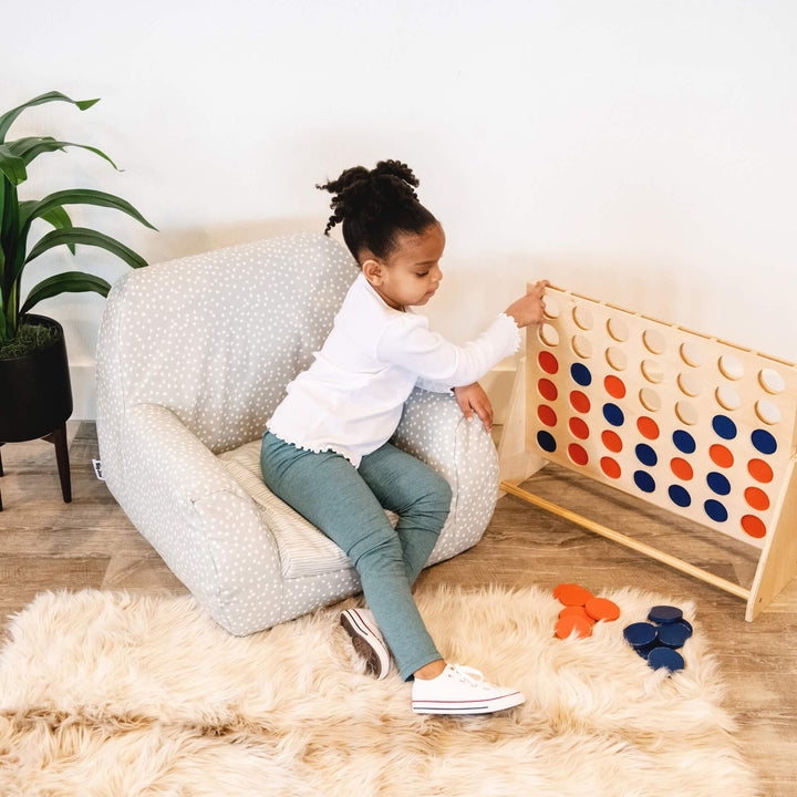 Kids chair Mid-Mod girl playing with toys #color_frolic-wonderland-lenox