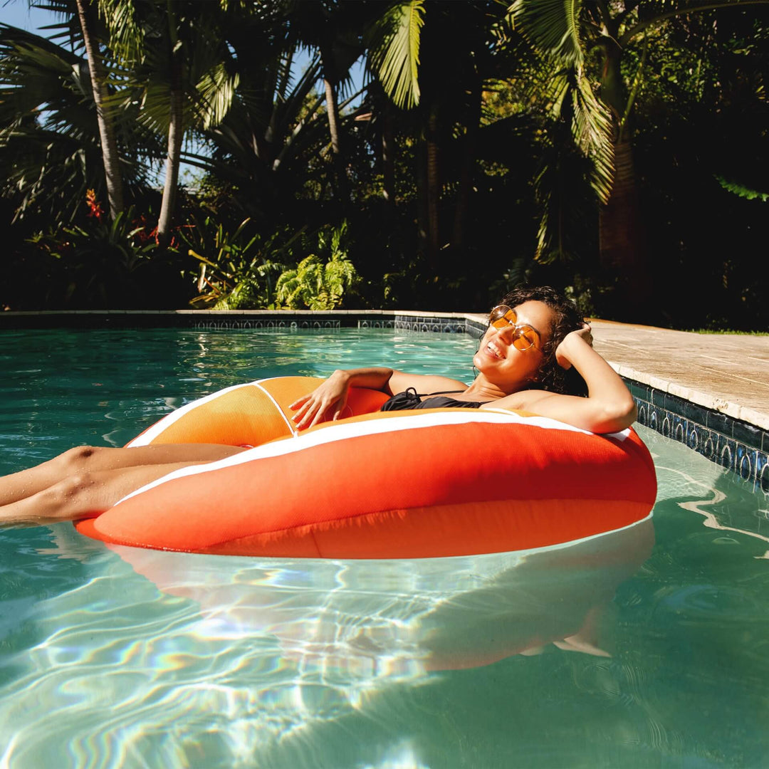 Bean Filled Pool Float shaped like orange lady realxing #style_orange
