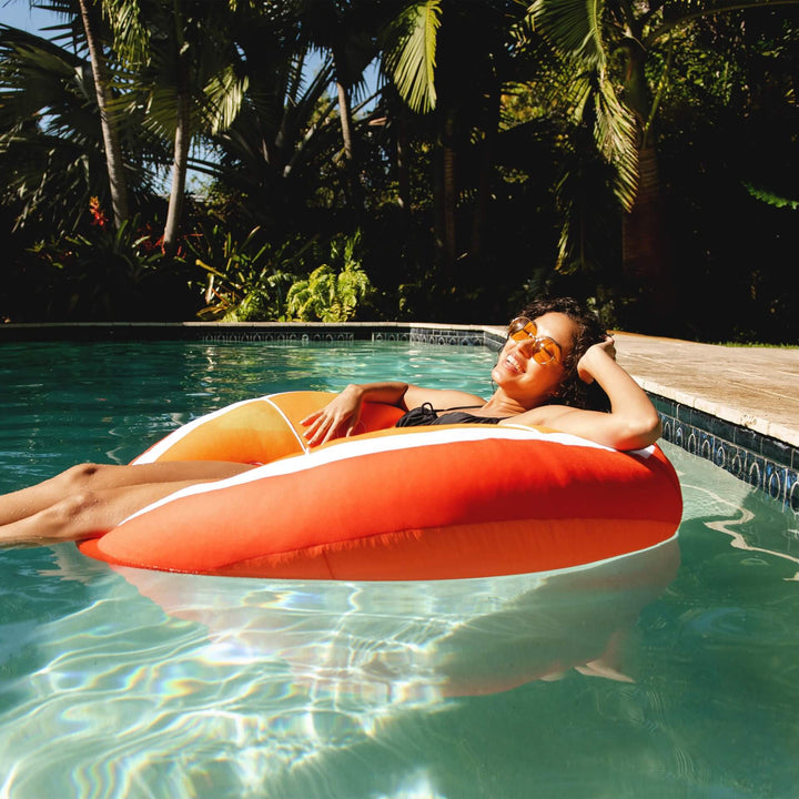 Bean Filled Pool Float shaped like orange lady realxing #style_orange