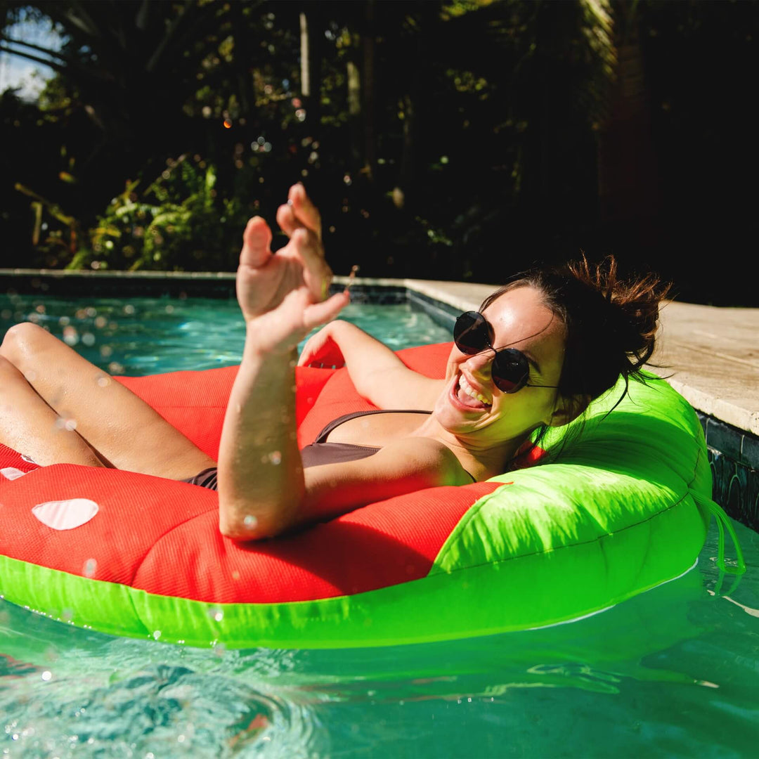 #style_strawberry pool float strawberry relaxing in pool #style_strawberry