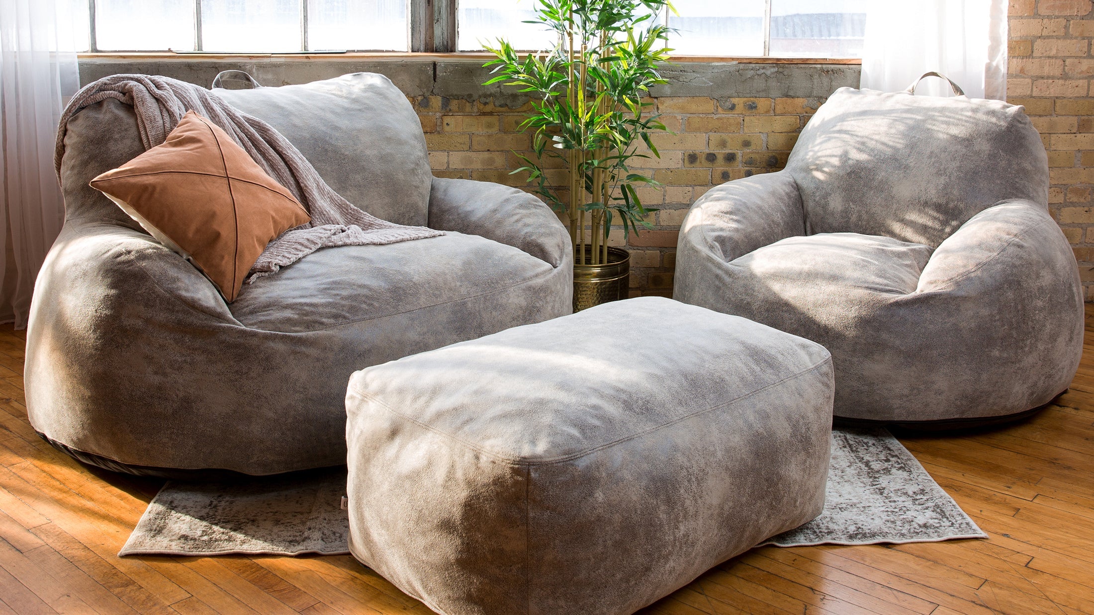 Nestle Chair and Futon with ottoman in the living room