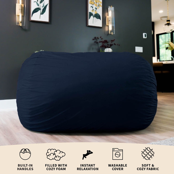 Navy blue bean bag chair in a room with decorative elements on the wall. #color_cobalt-brushed-denim