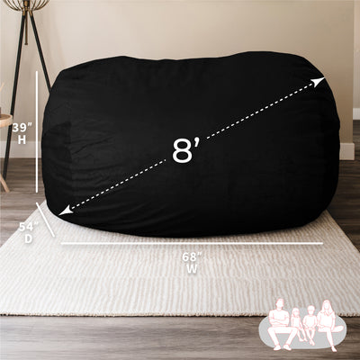 Black bean bag chair with measurements on a neutral background 