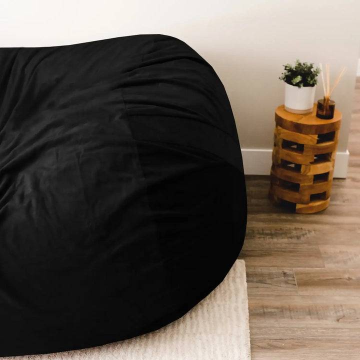 Fuf XXL Giant Bean Bag Chair side view #color_black-plush