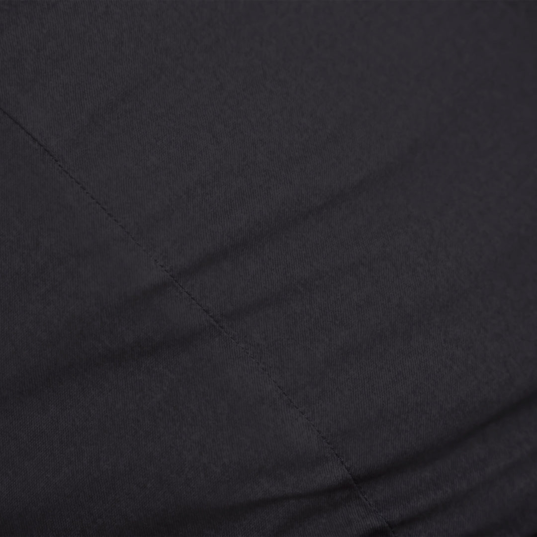 Close-up of black brushed denim fabric with visible texture #color_black-brushed-denim