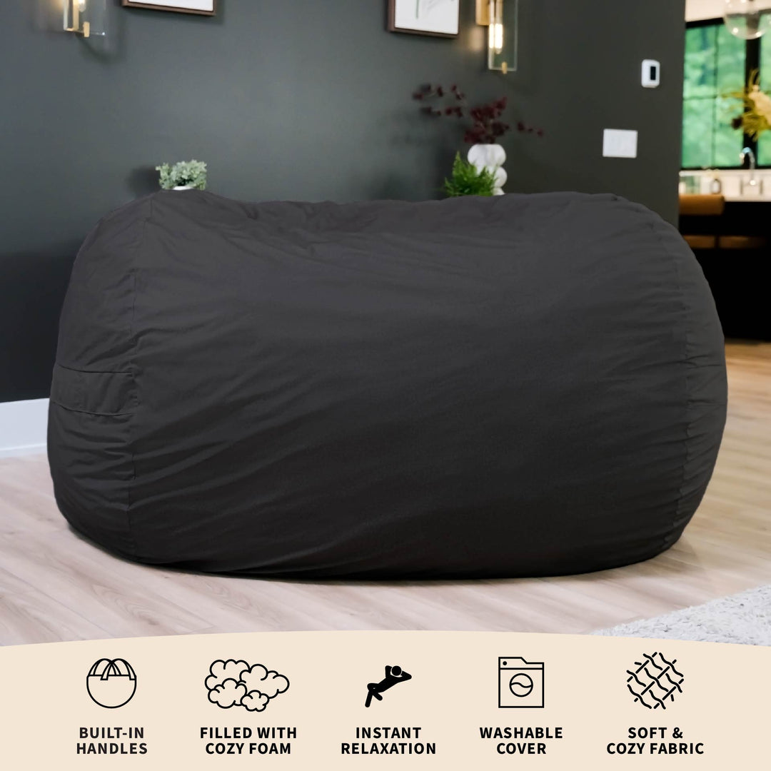 Black bean bag chair in a room with text highlighting features. #color_black-brushed-denim