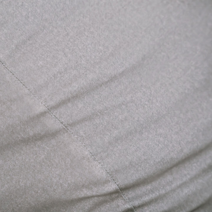 Close-up of a gray brushed denim fabric surface #color_fog-brushed-denim