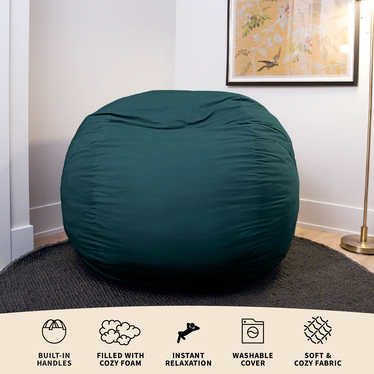 Teal bean bag chair in a room with a decorative painting on the wall. 