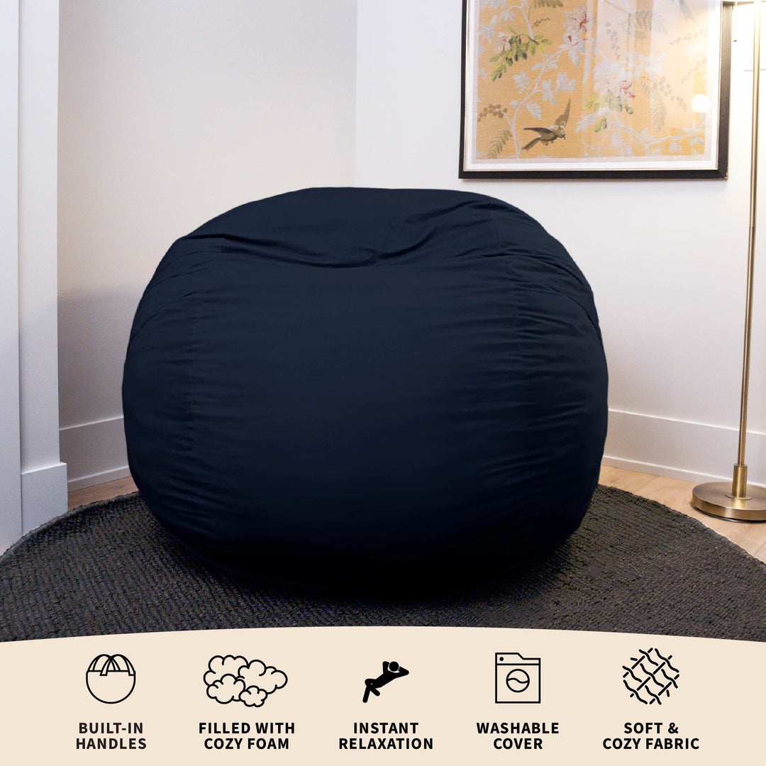 Navy blue bean bag chair in a room with text highlighting features. #color_cobalt-brushed-denim