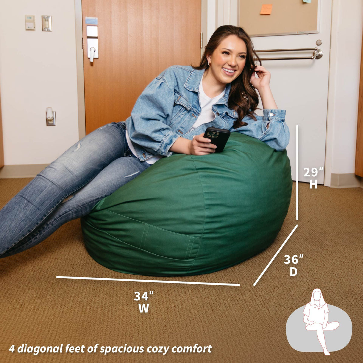 Woman sitting on a green bean bag chair with measurements displayed 