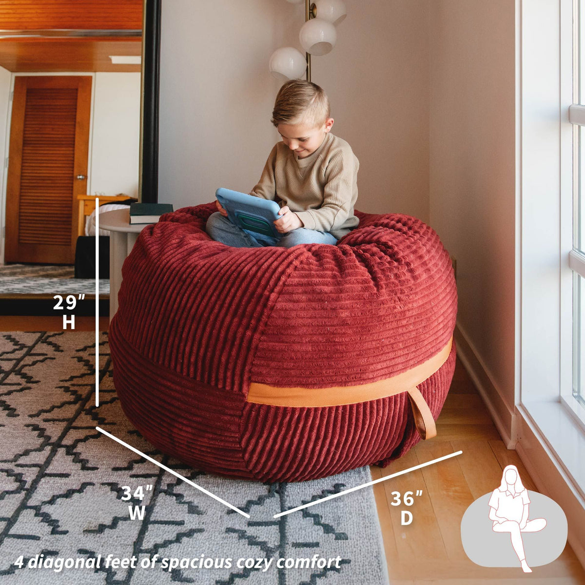 Child sitting on a red bean bag chair with measurements and text overlay in a room. 