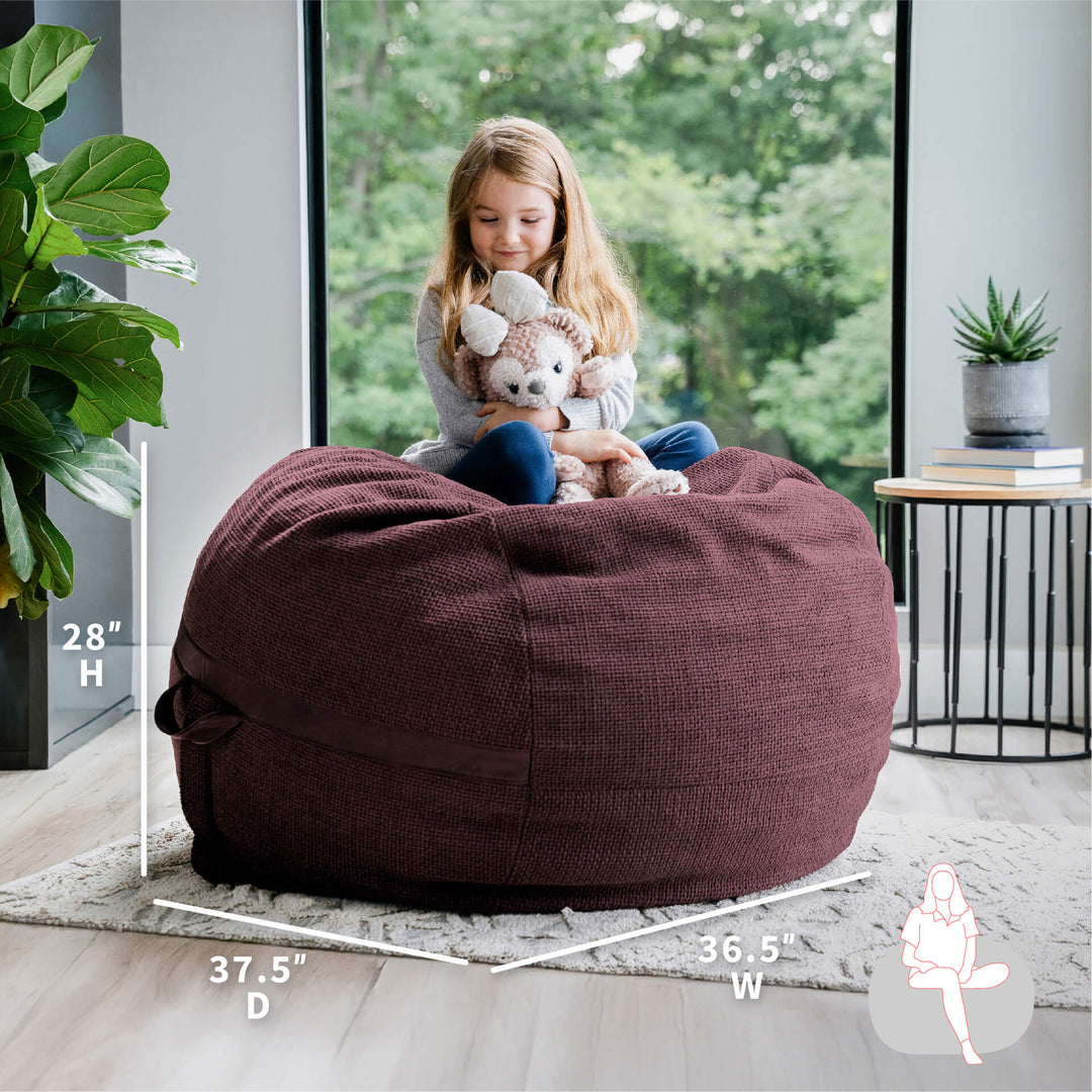 Child playing with stuffed animals on a merlot bean bag chair in a room with large windows. #color_merlot-cloudweave