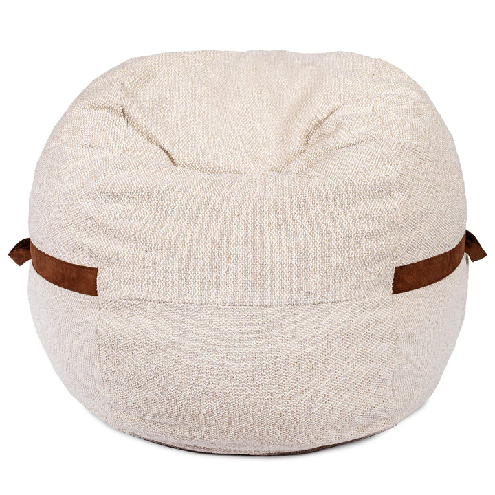 Beige bean bag chair with brown straps on a white background #color_sandstone-textured-boucle