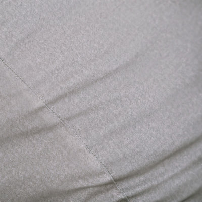 Close-up of a gray quilted fabric surface 