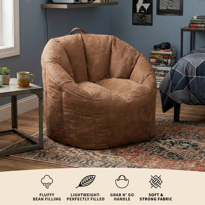 Brown bean bag chair in a room with a shelf and books. 