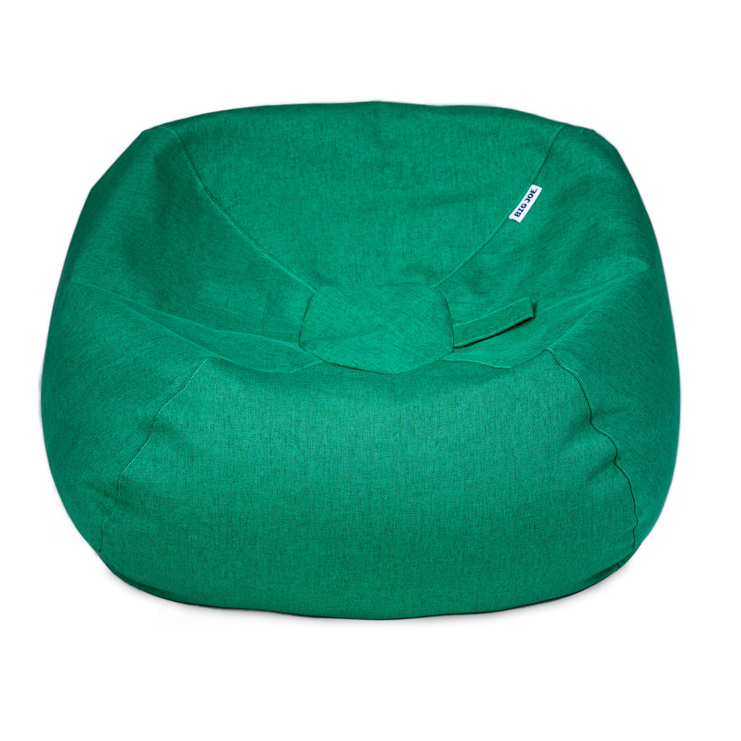 A green fabric bean bag chair with a small white brand tag on the upper right side, photographed against a solid white background. 