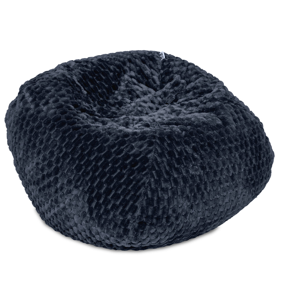 A round, dark navy blue bean bag chair with a textured, ribbed fabric surface, shown on a plain white background. 