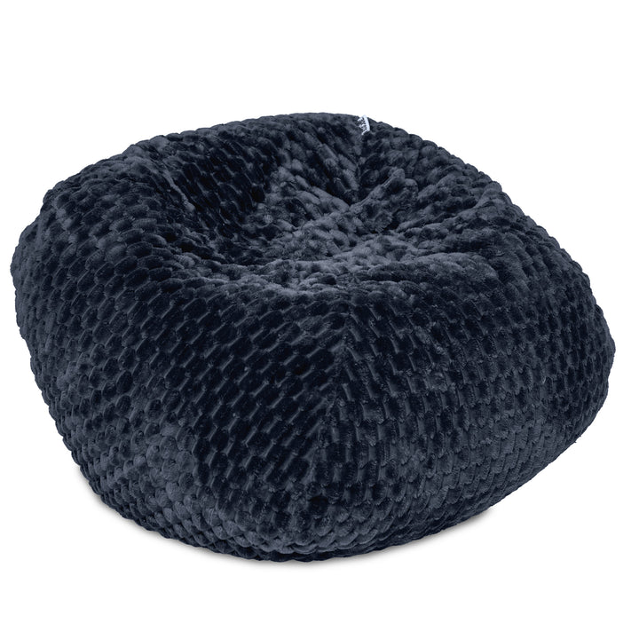 A round, dark navy blue bean bag chair with a textured, ribbed fabric surface, shown on a plain white background. 