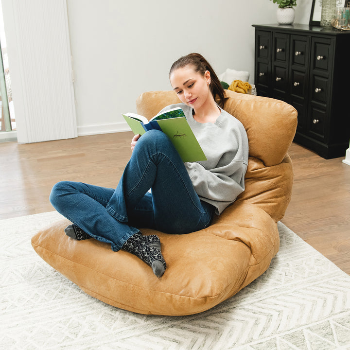 Woman reading on the Roma Bean Bag Chair for adults #color_rustic-tan