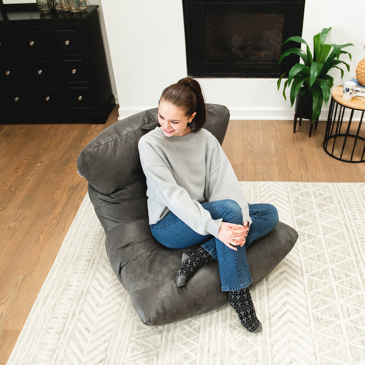 Lounging on the Roma Bean Bag Chair in Shadow Graphite Vintage Suede #color_shadow-graphite