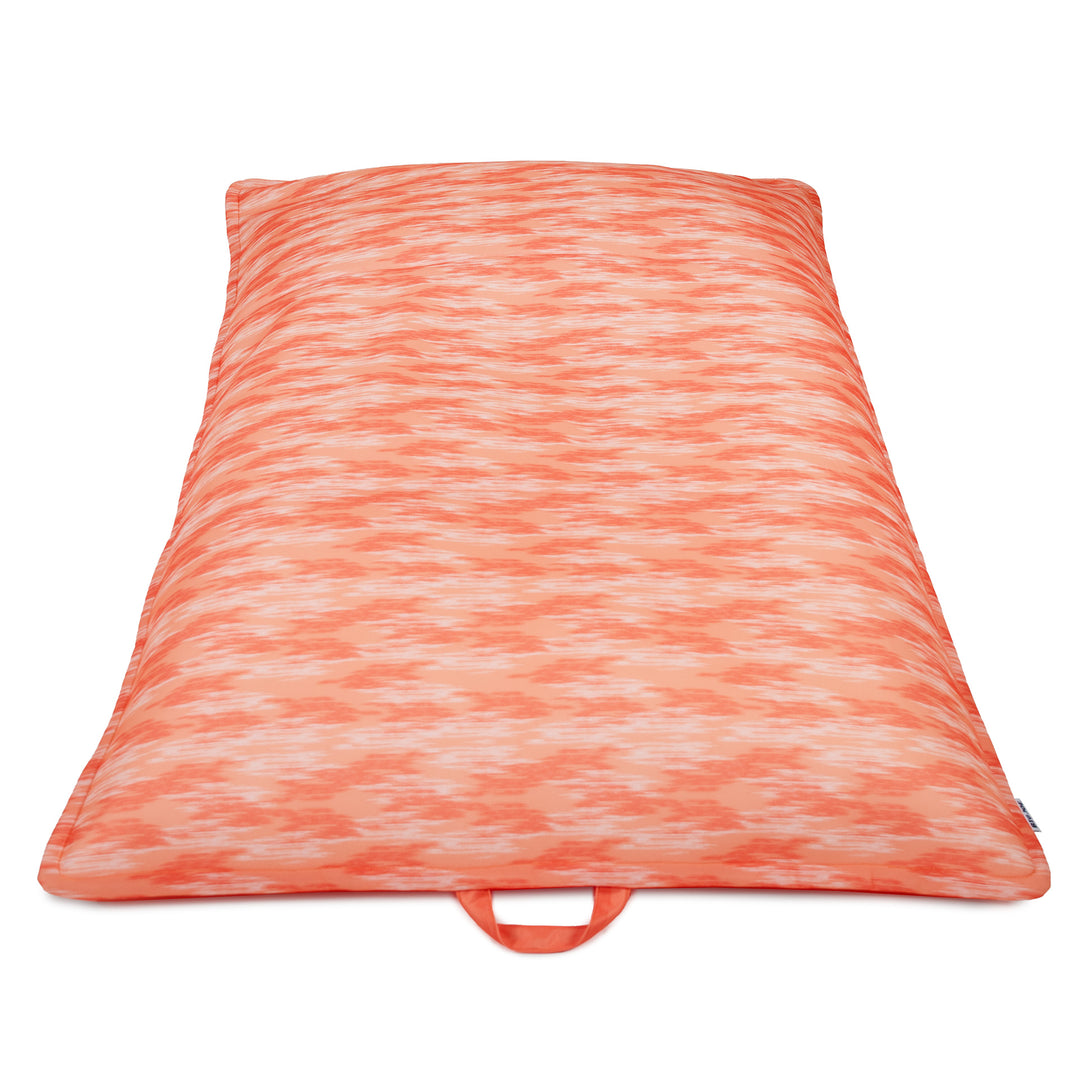 Orange and white patterned pool lounger on a white background #color_peach-glow