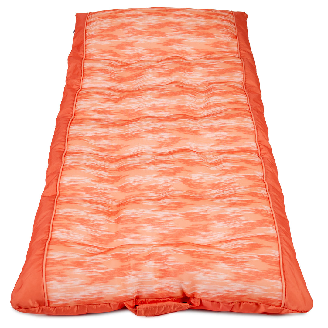 Peach and white patterned pool float on a white background #color_peach-glow