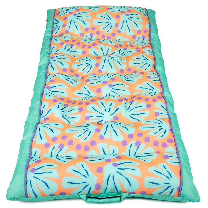 Colorful pool float with leaf pattern on a white background #color_sweet-shells-peach