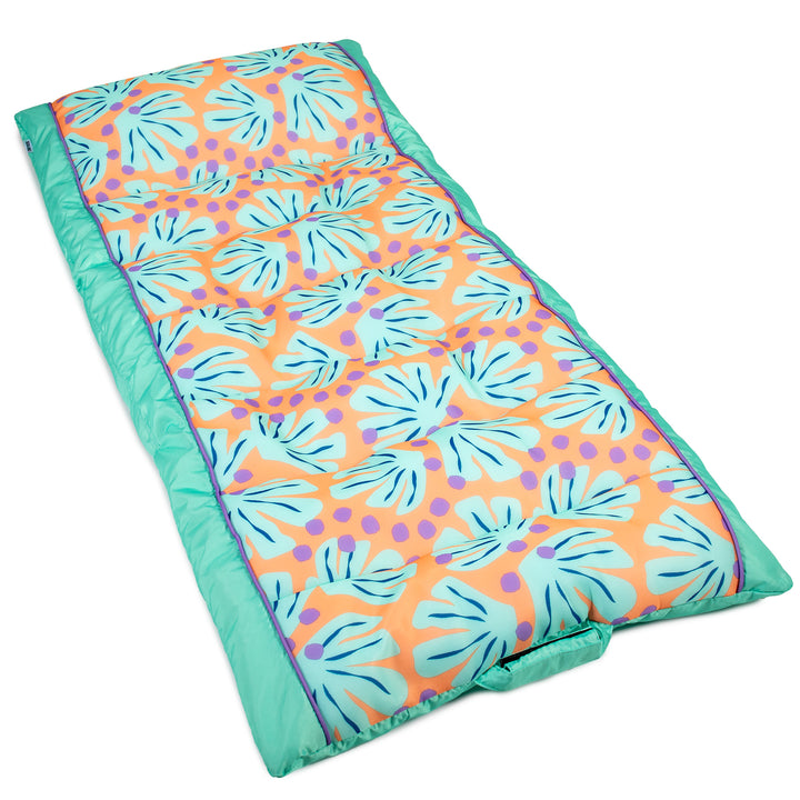 Colorful pool float with leaf pattern on a white background #color_sweet-shells-peach