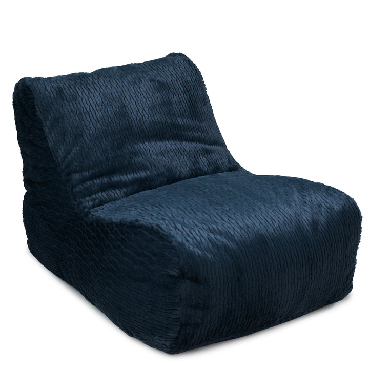 A dark navy blue plush lounge chair with a textured, ribbed fabric, shown at a three-quarter angle on a solid white background. 