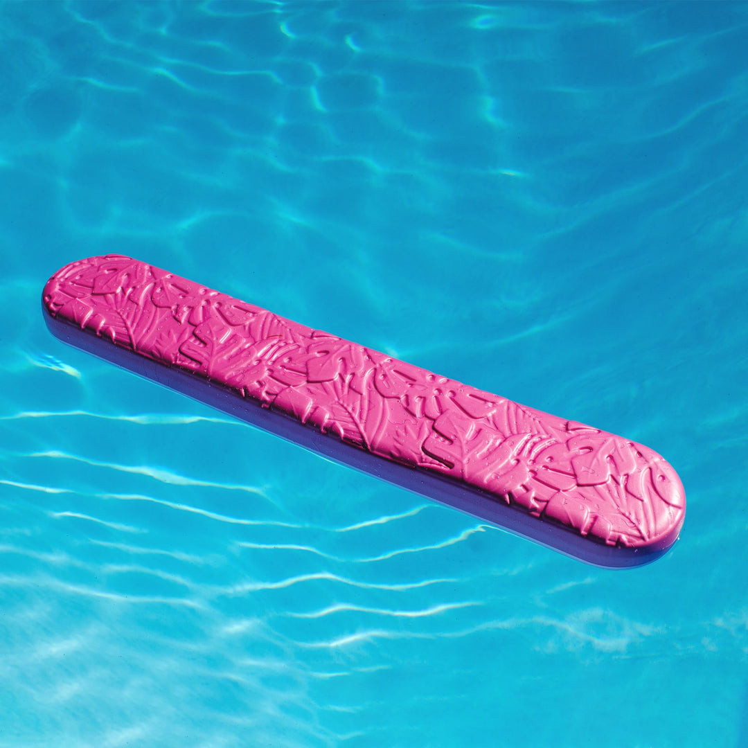 Floating in pool Aquaria Palm Drifter pool float #color_pink-palm