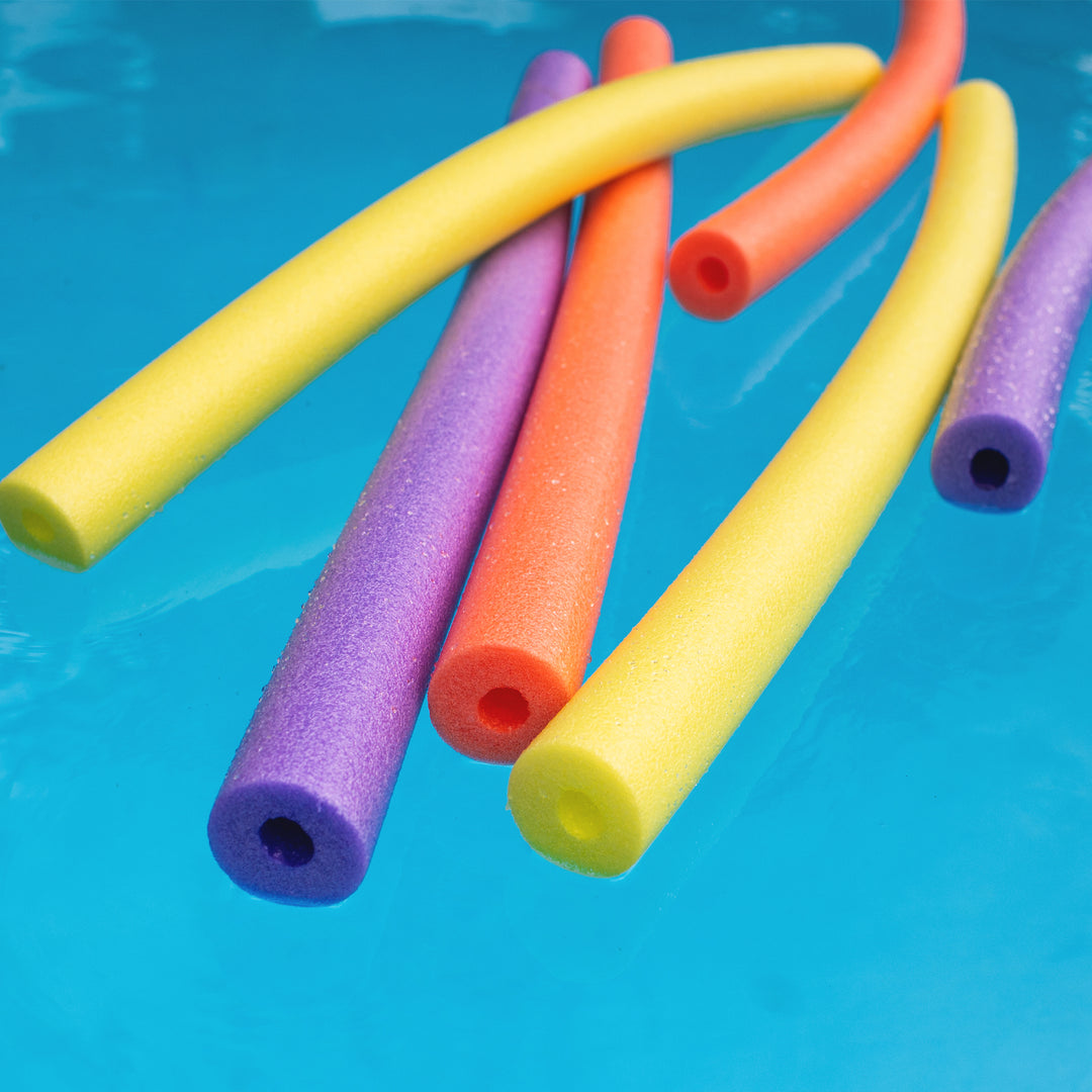 Colorful pool noodles on a blue pool background 