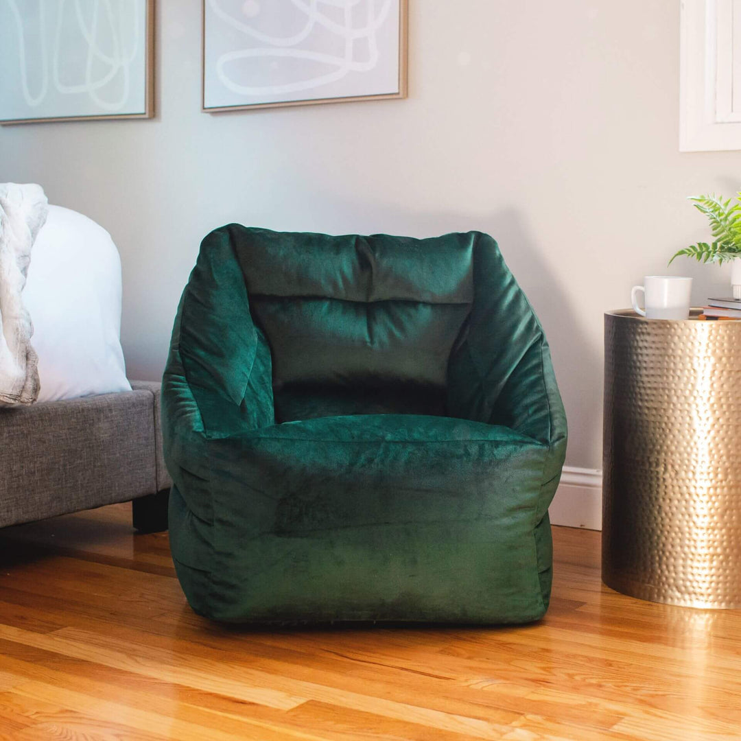 Accent chair in bedroom #color_deep-emerald-velvet