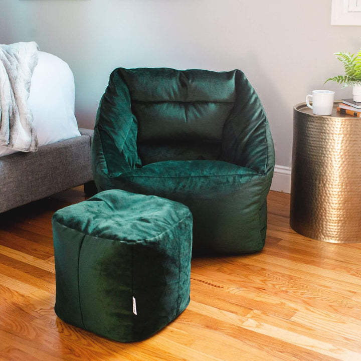Green velvet Aurora bean bag chair and ottoman combo in room #color_deep-emerald-velvet