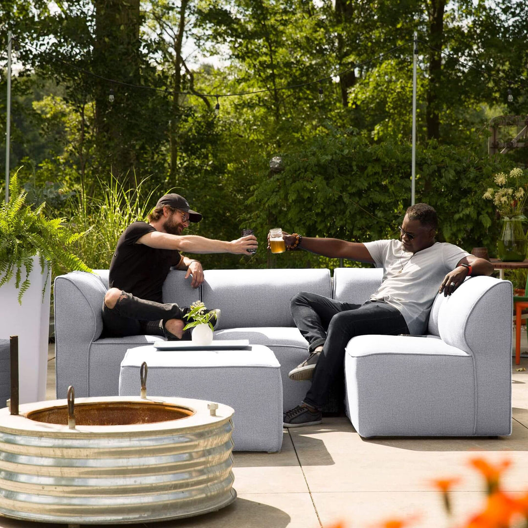 Men relaxing on the patio on a 5pc sectional #color_fresh-gray