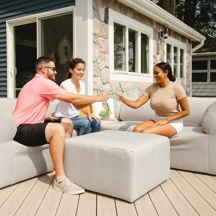 Outdoor 6pc sectional sofa people relaxing on patio  #color_light-gray-bask
